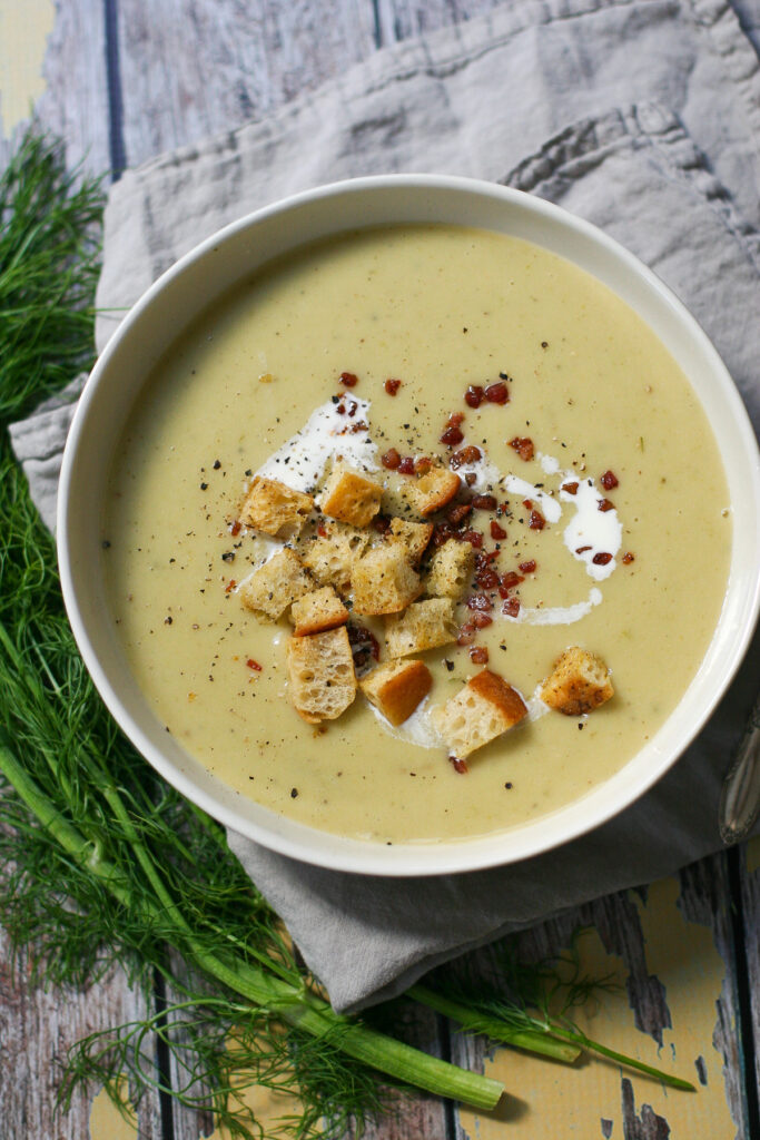 Creamy Potato Soup with Pancetta Garlic Croutons overhead shot with napkin